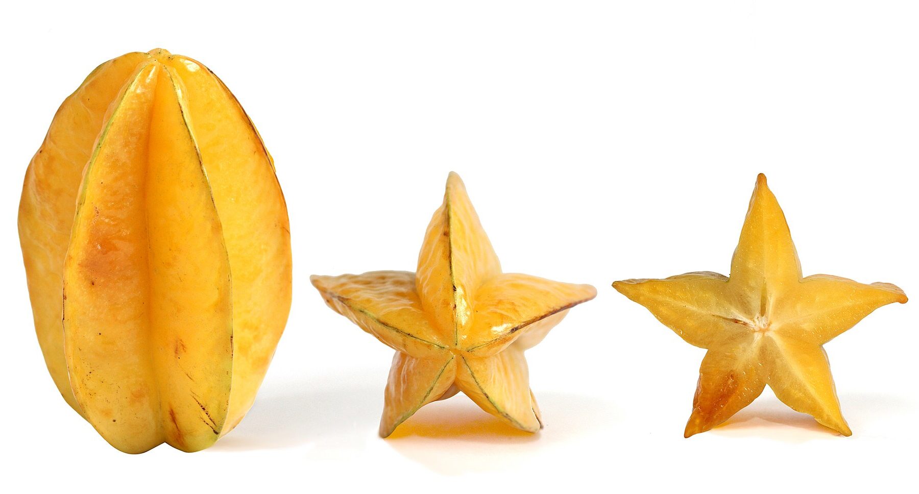 Ripe Carambolas, also known as starfruit, the fruit of Averrhoa carambola tree: vertical, side and cross section profiles. The fruit in cross section is a five-pointed star, hence its name.